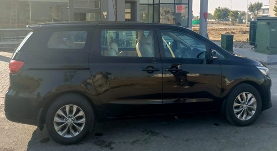 Side - Kia Grand Carnival Rent a Car